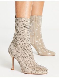 Elegant embellished high-heeled ankle boots in cream