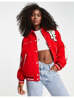 varisity bomber with collar and embroidery detail in red