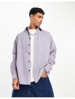 90s oversized cord shirt with oversized double side entrance pockets in lilac