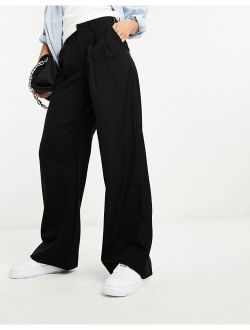tailored adjustable waist pants in black
