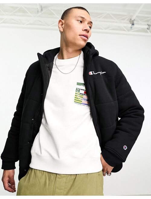 Champion small logo puffer jacket in black