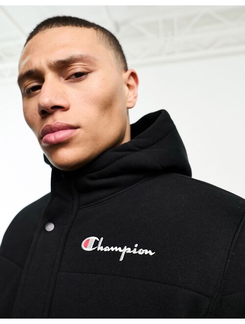 Champion small logo puffer jacket in black