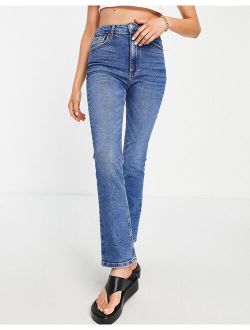 vintage fit straight jeans in mid wash