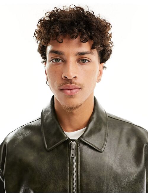ASOS DESIGN oversized bomber jacket in distressed faux leather in green