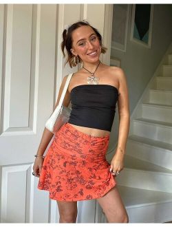X Chloe Davie Y2K flippy mini skirt in retro orange floral