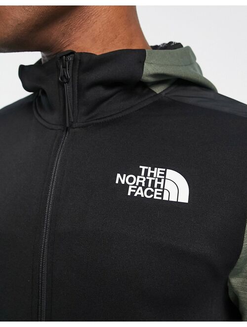 The North Face Training Mountain Athletics zip up fleece hoodie in green/black