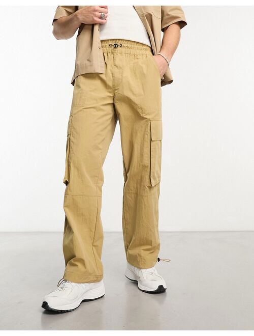 ASOS DESIGN wide leg nylon cargo pants with elastic waist in beige