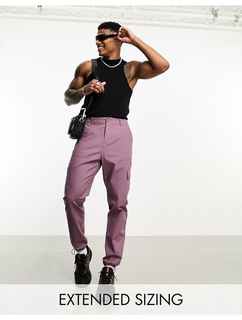 ASOS DESIGN tapered cargo pants in purple