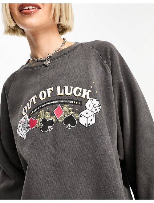 Daisy Street relaxed sweatshirt in vintage wash with lucky graphic