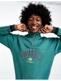 half zip sweatshirt with bulldogs graphic in washed green