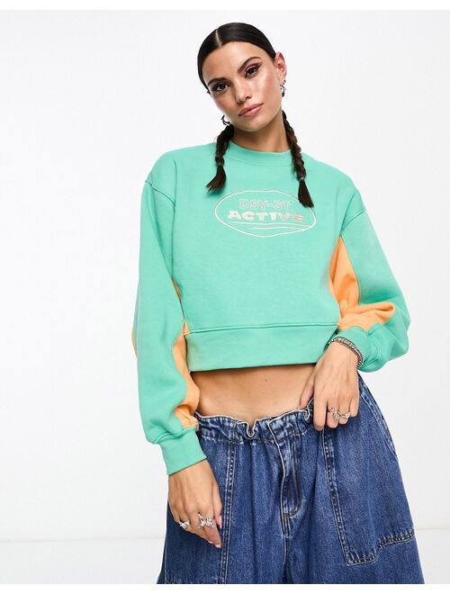 Daisy Street Active Distorted Geo cropped sweatshirt in green