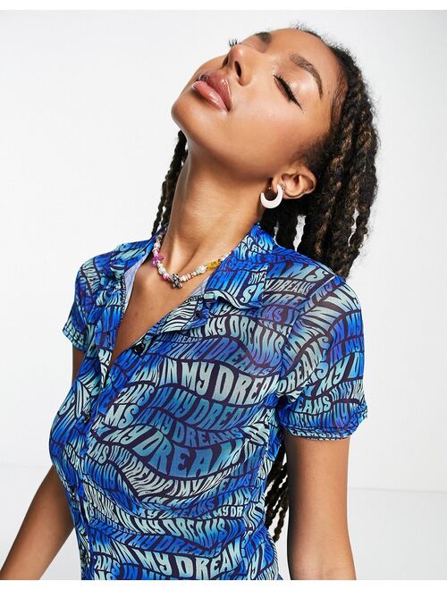 Daisy Street button front t-shirt mini dress in wavy blue text print mesh