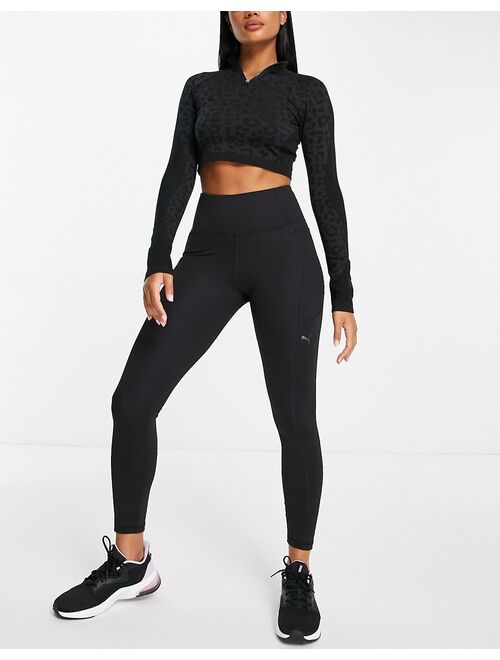 Puma Training Formknit seamless 1/4 zip top in black leopard print