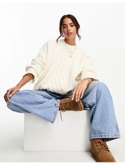 oversized cable sweater in cream