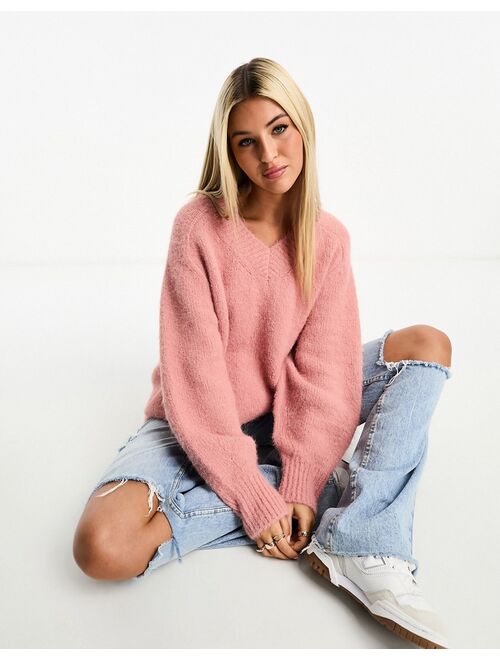 ASOS DESIGN chunky oversized v neck sweater in brushed yarn in pink