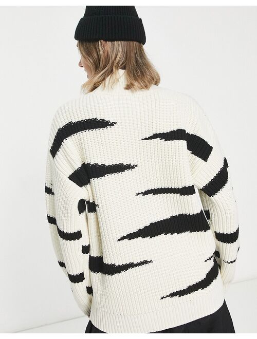 ASOS Petite ASOS DESIGN Petite chunky sweater with high neck in animal stripe pattern