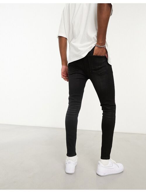 ASOS DESIGN spray on jeans with power stretch in washed black
