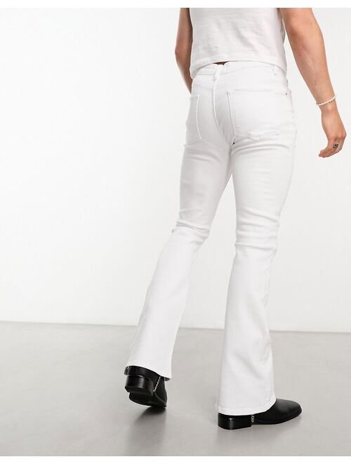 ASOS DESIGN flared jeans with distressed rips in white