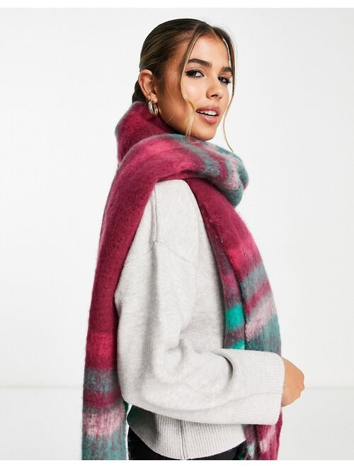 ASOS DESIGN fluffy tassel scarf in green and pink jewel check