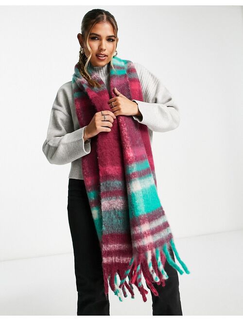 ASOS DESIGN fluffy tassel scarf in green and pink jewel check