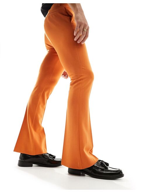 ASOS DESIGN skinny flared smart pants in orange