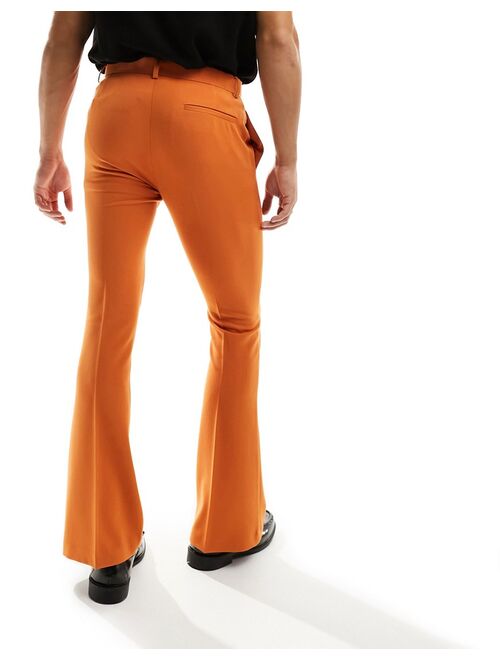 ASOS DESIGN skinny flared smart pants in orange