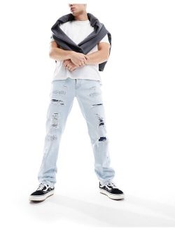 straight leg jeans with rip repair detail in light wash blue