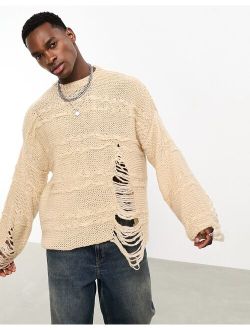 oversized knitted distressed sweater in stone