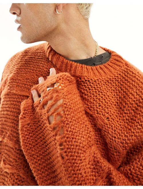 ASOS DESIGN oversized knit distressing ladder detail sweater in burnt orange