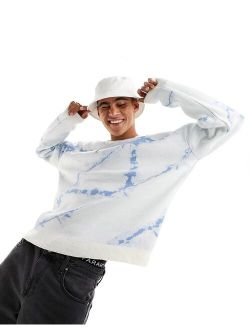 relaxed knit sweater with tie-dye pattern in blue