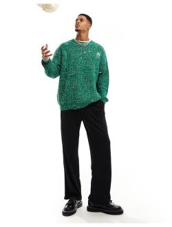 oversized chunky knit rib sweater with distressing in green twist