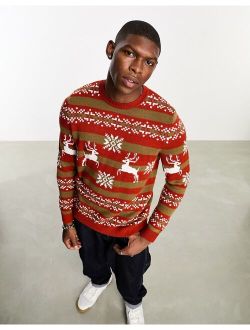 knitted Christmas sweater with orange fairisle stag pattern