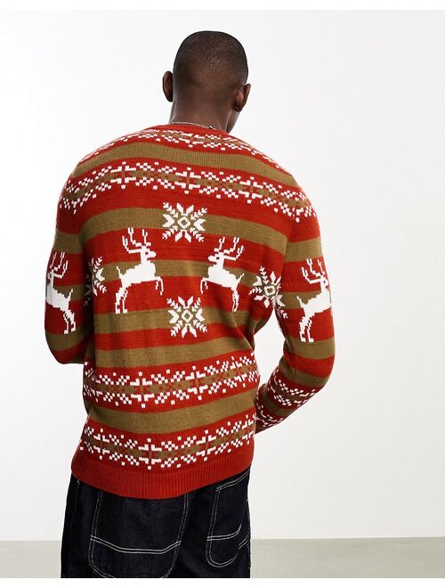 ASOS DESIGN knitted Christmas sweater with orange fairisle stag pattern