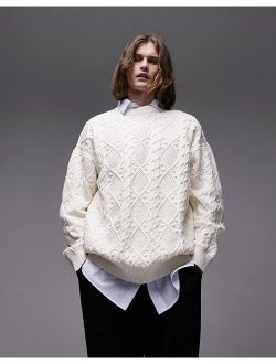 multi stitch cable knit sweater in ecru