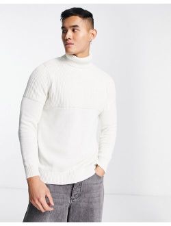 textured roll neck sweater in white