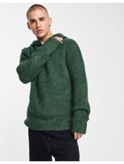 relaxed knitted sweater with hood in green