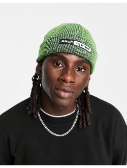 fisherman ribbed beanie in neon and black twist with rubber patch