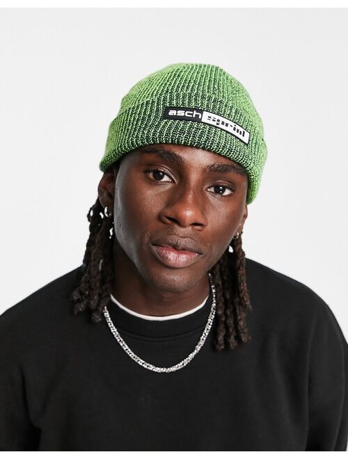 ASOS DESIGN fisherman ribbed beanie in neon and black twist with rubber patch