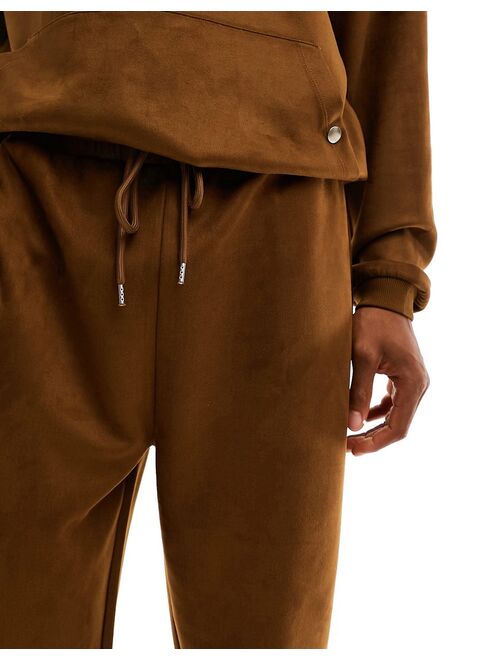 ASOS DESIGN tapered sweatpants in suedette texture in brown