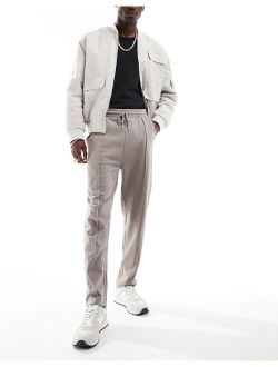 tapered sweatpants with pintuck in washed pink