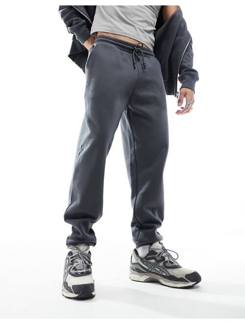 ASOS DESIGN tapered heavyweight sweatpants in washed black
