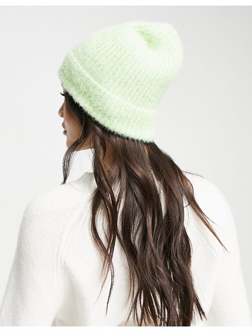 ASOS DESIGN fluffy knit beanie in lime green