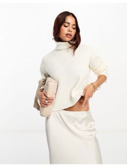 boxy sweater in rib with roll neck in cream