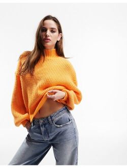 chunky ribbed sweater with high neck in orange