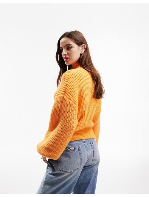 ASOS DESIGN chunky ribbed sweater with high neck in orange