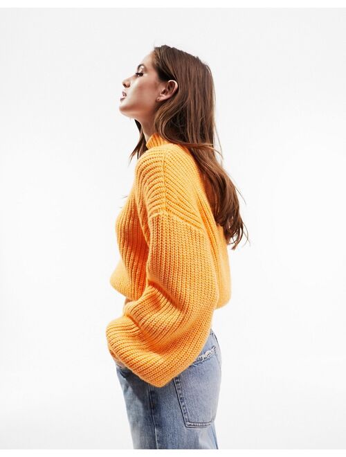 ASOS DESIGN chunky ribbed sweater with high neck in orange
