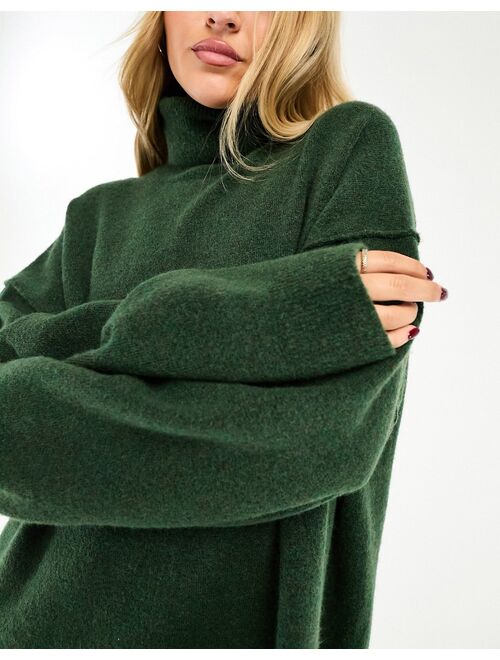 Weekday Annie wool blend roll neck mini knitted sweater dress in dark green melange exclusive to ASOS
