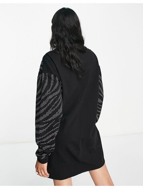 ASOS DESIGN oversized mini sweats dress with silver tiger embellishment in black