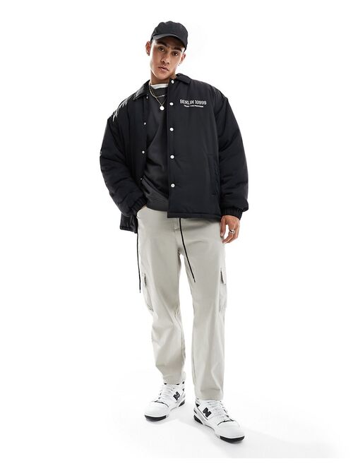 ASOS DESIGN oversized nylon coach jacket with back print in black and white