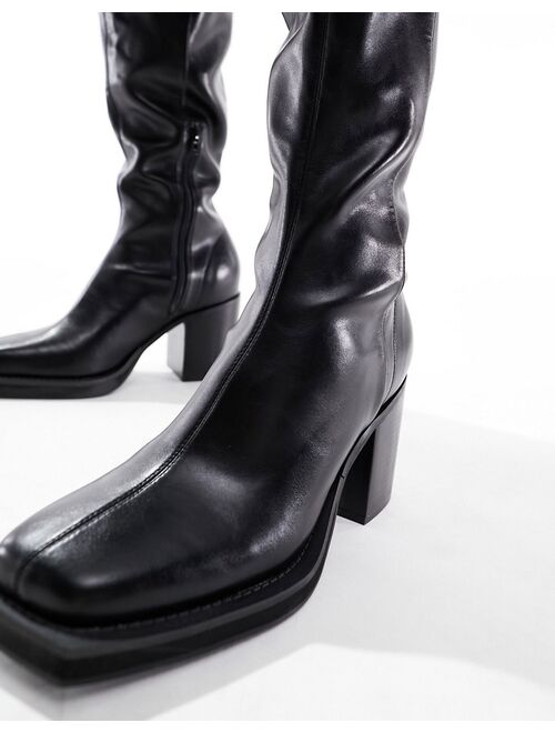 ASOS DESIGN over the knee heeled chelsea boots on chunky sole in black